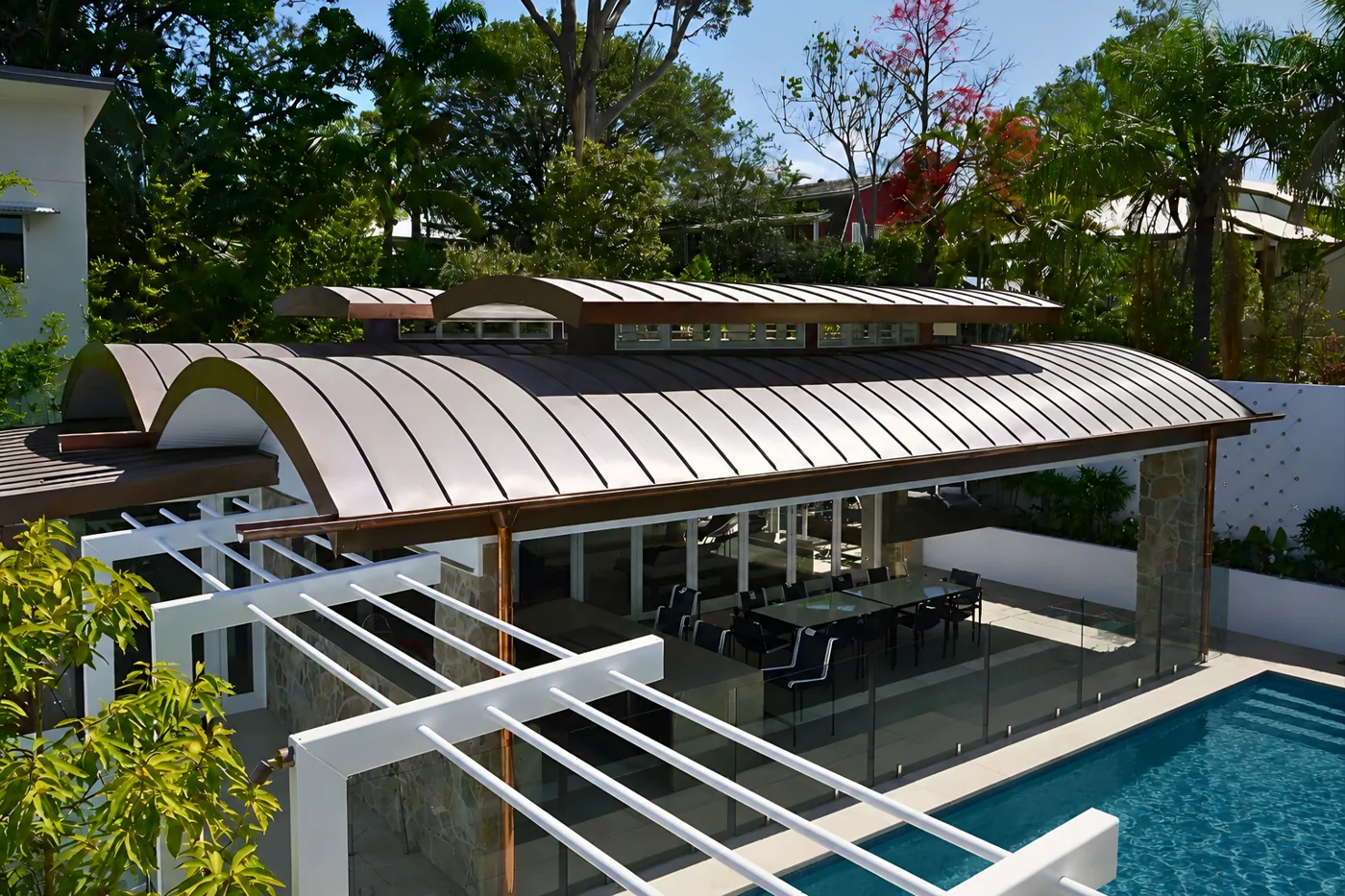 Curved copper standing seam pool pavilion — Hawthorne QLD by Euroclad
